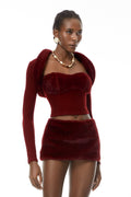 Conjunto de set de ropa MRTokyo con bolero con borde de piel color burdeos, top y falda, en un estilo elegante y moderno.