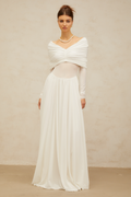 Vestido largo blanco Vérane con drapeado y ruched, estilo maxi, ideal para ocasiones elegantes, en imagen con detalles de tela fluida.