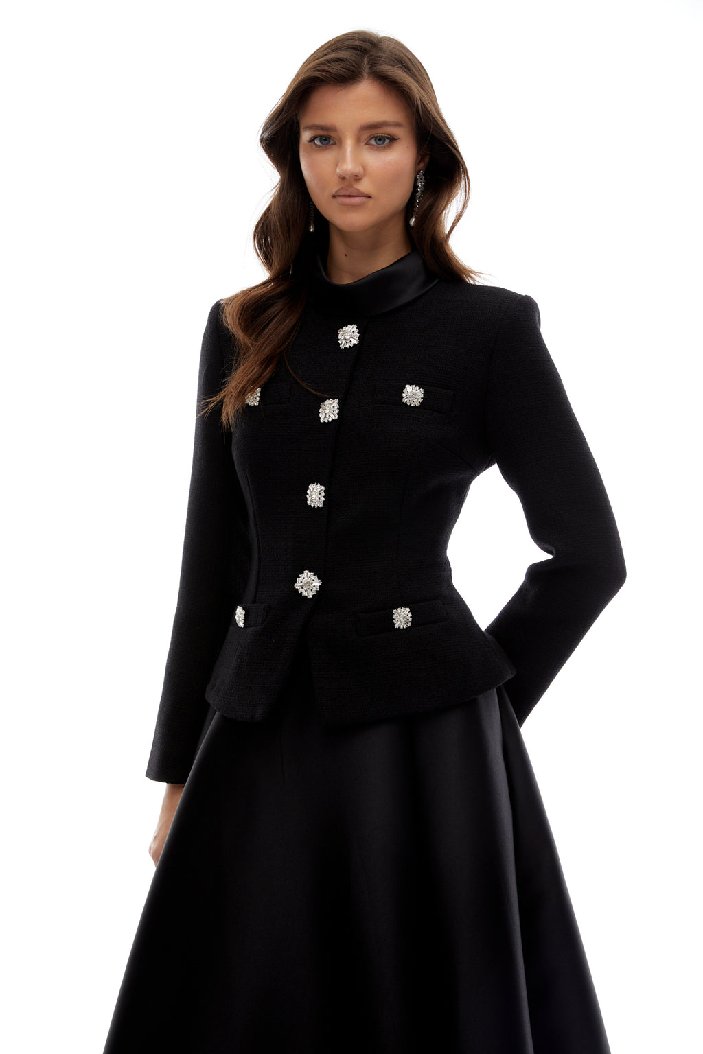 Vestido midi negro de tweed con cuello alto de la marca Bridal, diseñado por Lorelei, en color negro y estilo elegante.