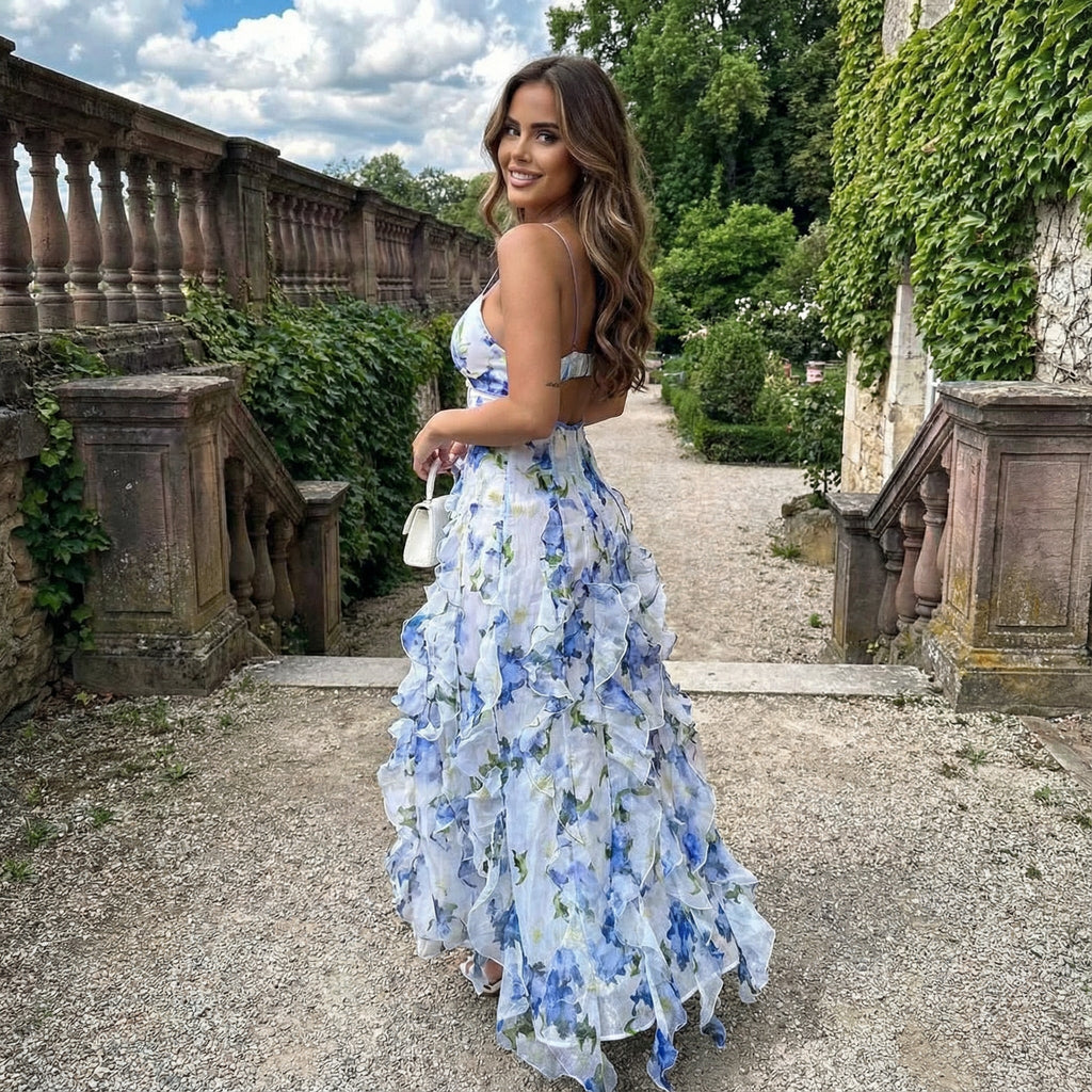 Vestido floral con volantes para invitada de boda de la marca SLIPPO®, con detalles ruffle en el diseño.