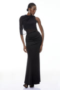 Conjunto de top y falda asimétricos negros Calypso de MRTokyo, con detalles ruched y diseño elegante.