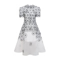 Vestido midi de encaje con apliques florales blancas de Bridal, diseño de tul con detalles delicados y elegantes para ocasiones especiales.