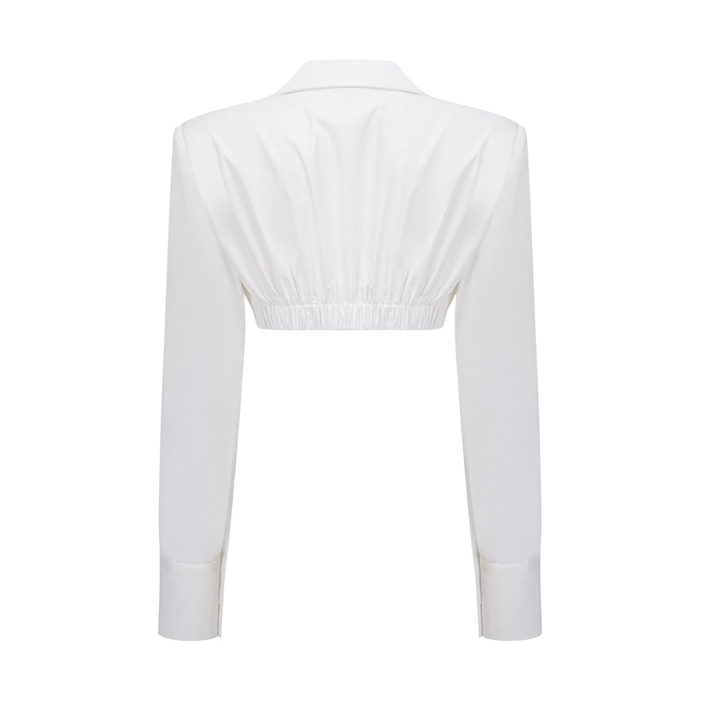 Conjunto de blusa y falda blanca con frunces de la marca Bridal, diseñado para un estilo elegante y sofisticado.