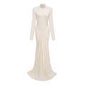Vestido maxi blanco con recortes y ruched de la marca Bridal, con detalles elegantes y estilo sofisticado.