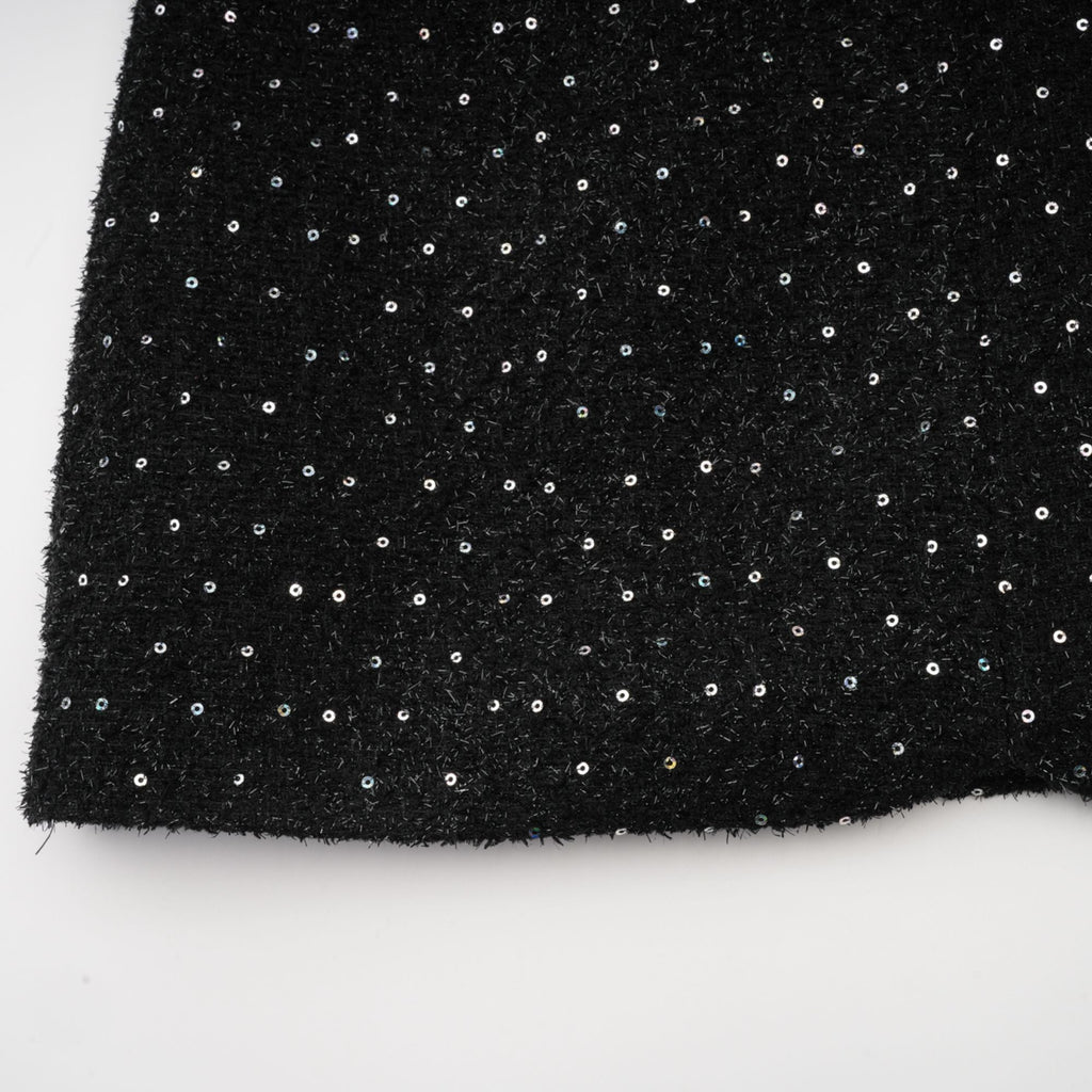 Vestido mini de tweed con perlas falsas Éléonore de Final Sale, muestra el diseño elegante y detalles de la prenda.