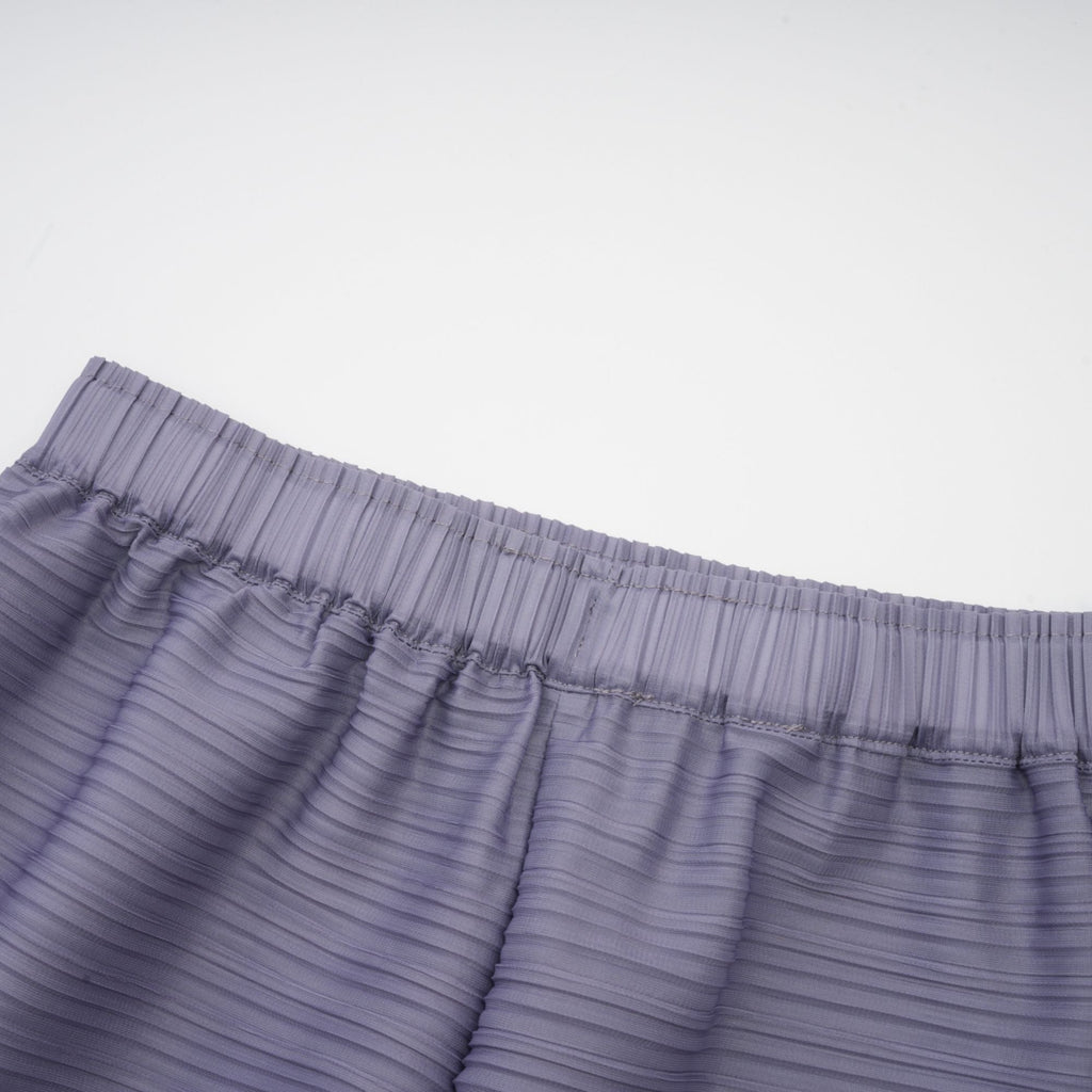 Conjunto de blusa y pantalones a juego en degradado púrpura arrugado de Final Sale, con detalles elegantes y estilo moderno.
