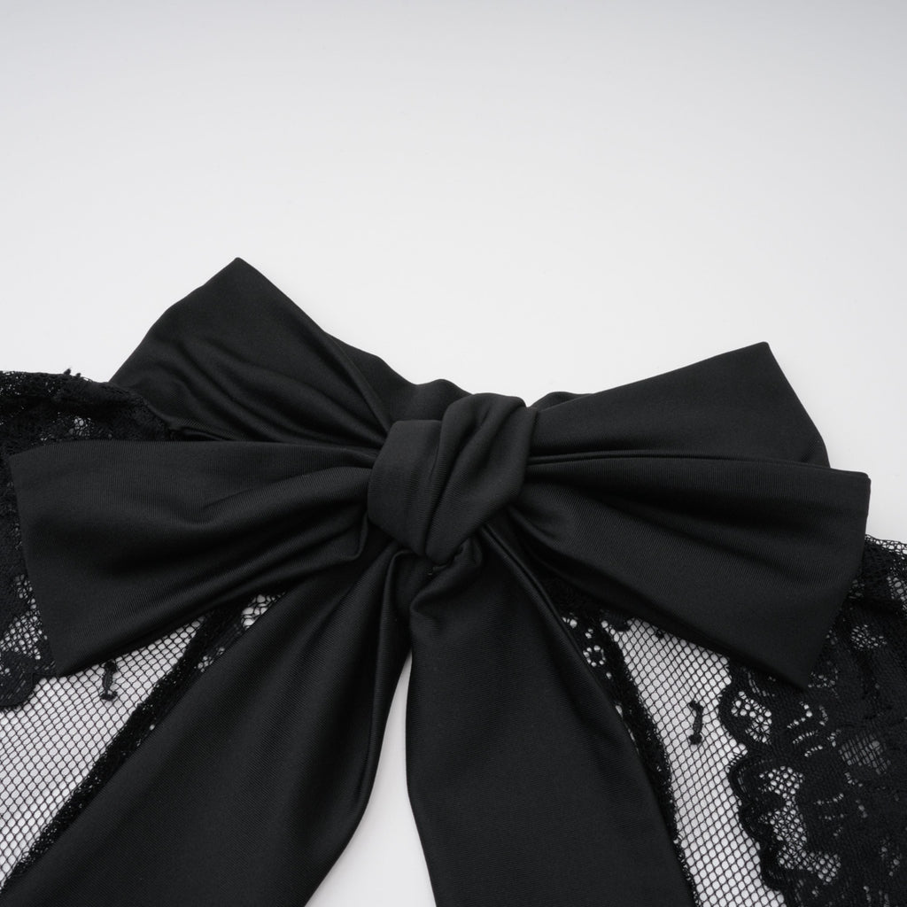 Vestido largo de novia negro con panel de encaje, diseño maxi y elegante, de la marca Bridal, en color negro.
