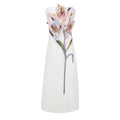 Vestido maxi blanco con bordados florales de otoño de la marca Bridal, con detalles elegantes y estilo romántico.