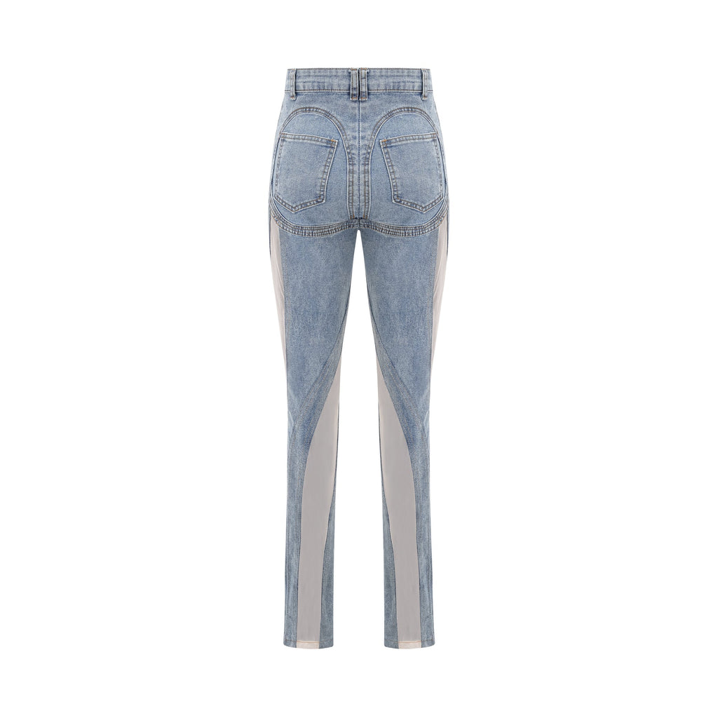 Jeans de paneles transparentes Aélis de marca Final Sale, estilo ajustado y moderno, con detalles de costuras visibles.