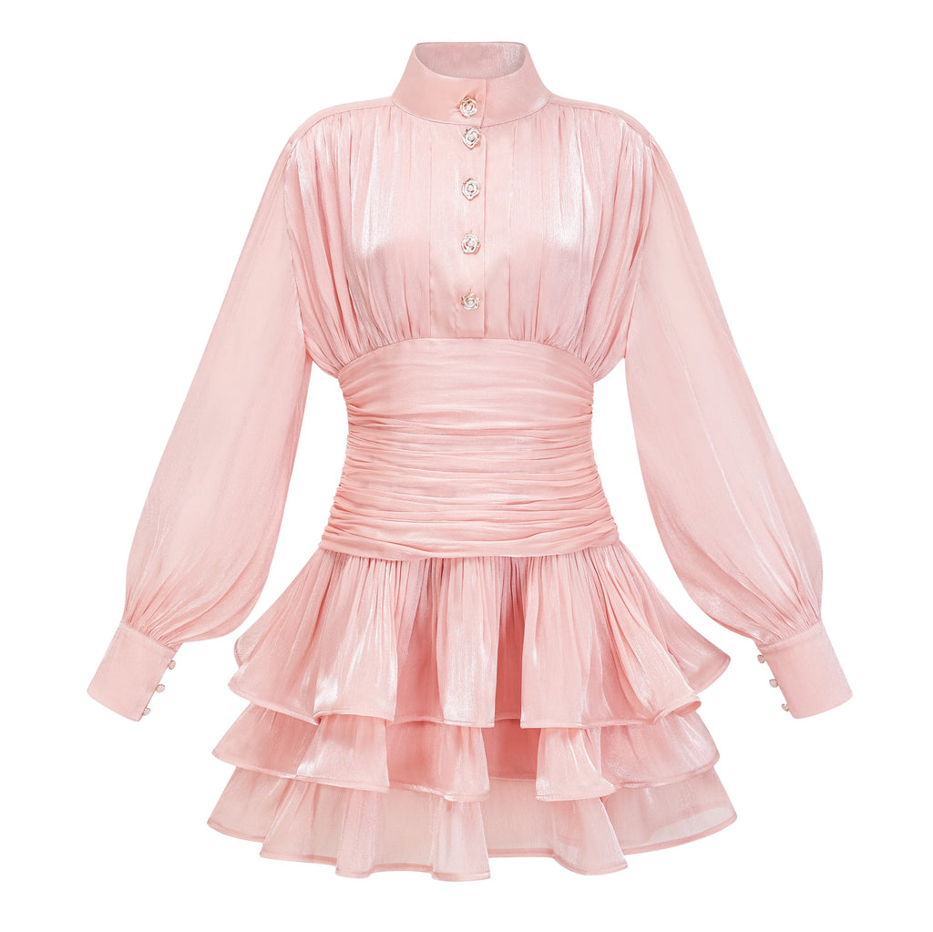 Vestido mini de encaje rosa con cuello alto y detalles de volantes, diseñado por Bridal, vista frontal sobre fondo neutro.