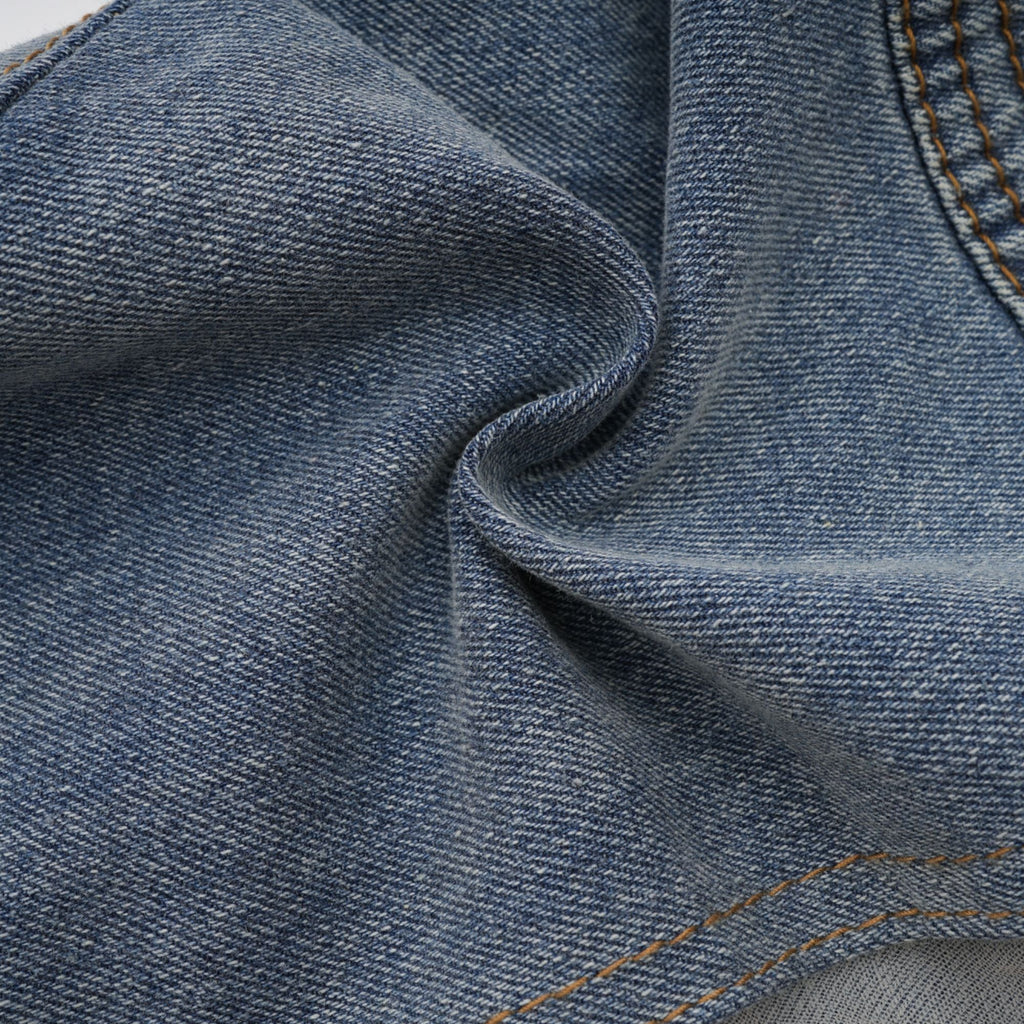 Jeans de mezclilla con paneles transparentes de la marca Final Sale, estilo ajustado y diseño moderno.