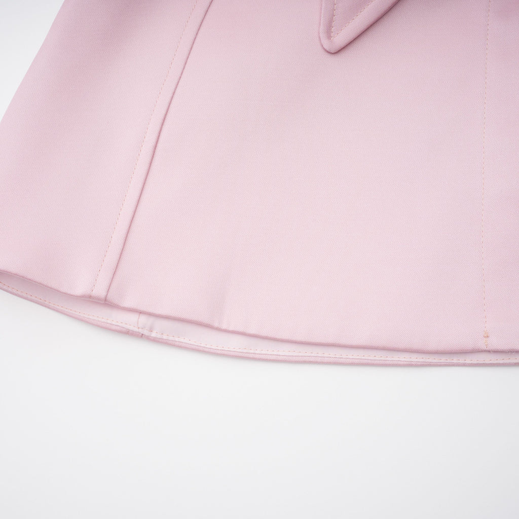 Conjunto de top capa rosa Clara Pink y falda de tul para novia, con detalles elegantes y delicados en la imagen.