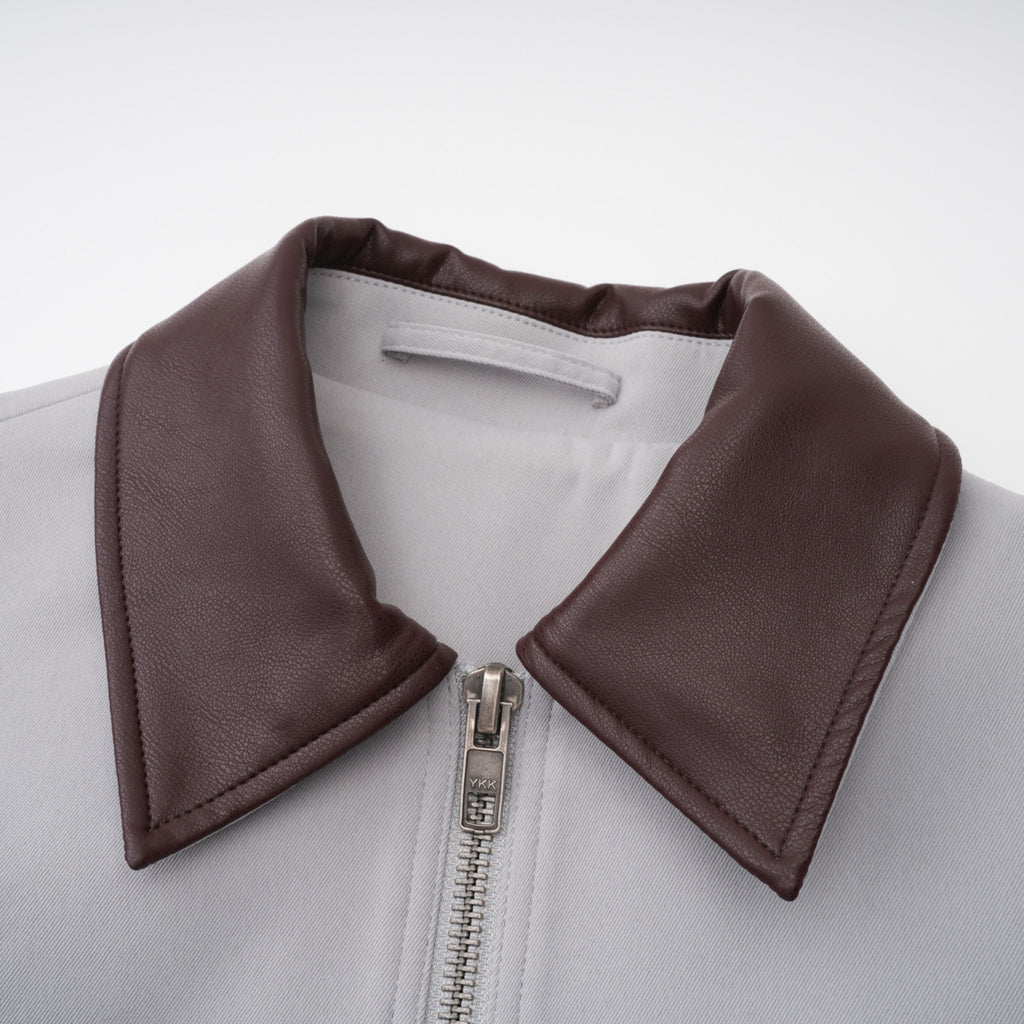 Chaqueta de caza Vilma en cuero gris de Bridal, con cuello ajustable y diseño elegante para actividades al aire libre.