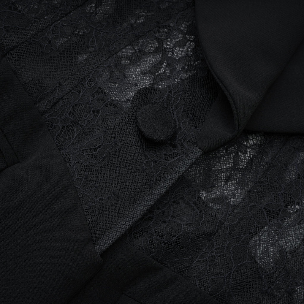 Blazer negro de encaje floral Verena Bridal con paneles elegantes, ajuste entallado y detalles sofisticados para ocasiones especiales.