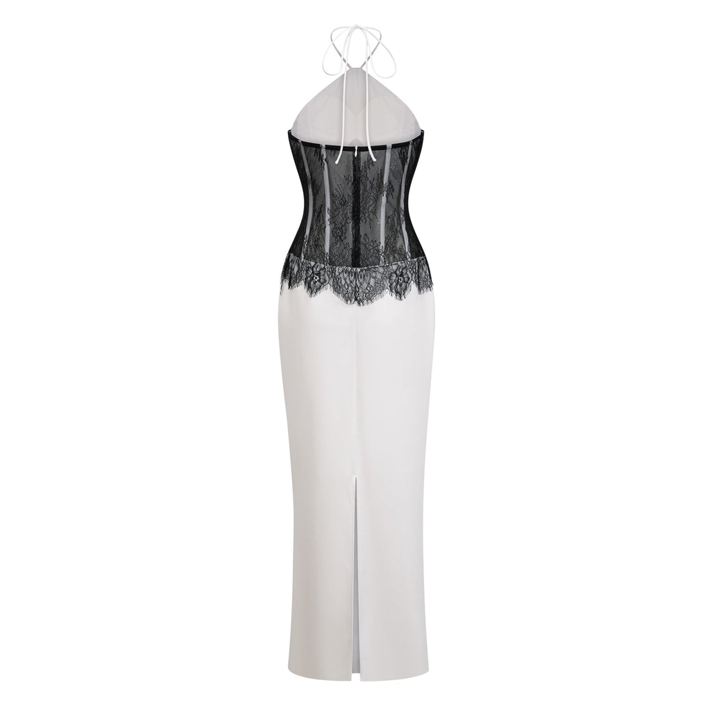 Vestido largo blanco de encaje con recortes y diseño maxi de la marca Bridal, visible en la imagen.