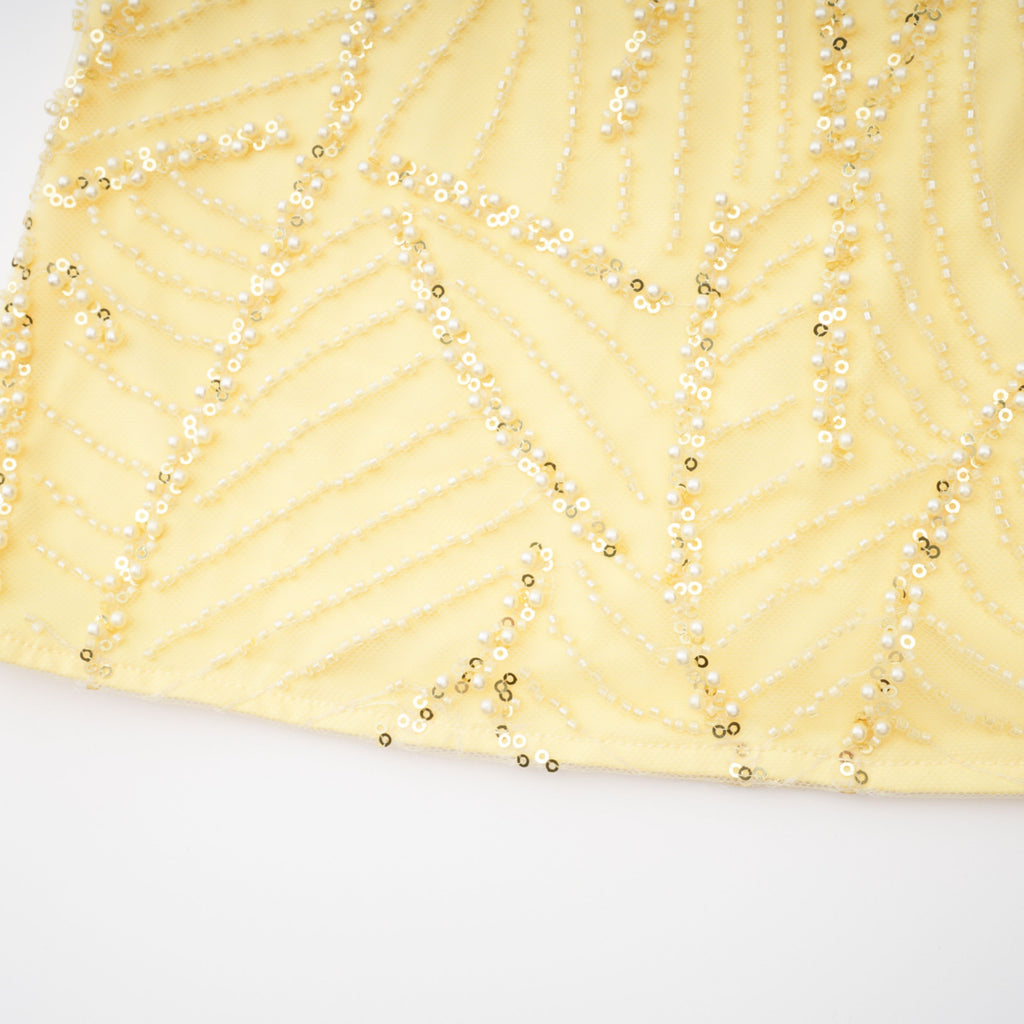 Vestido largo Maxi amarillo con lazo halterneck de MRNewyork, con diseño elegante y fluido, ideal para eventos formales.