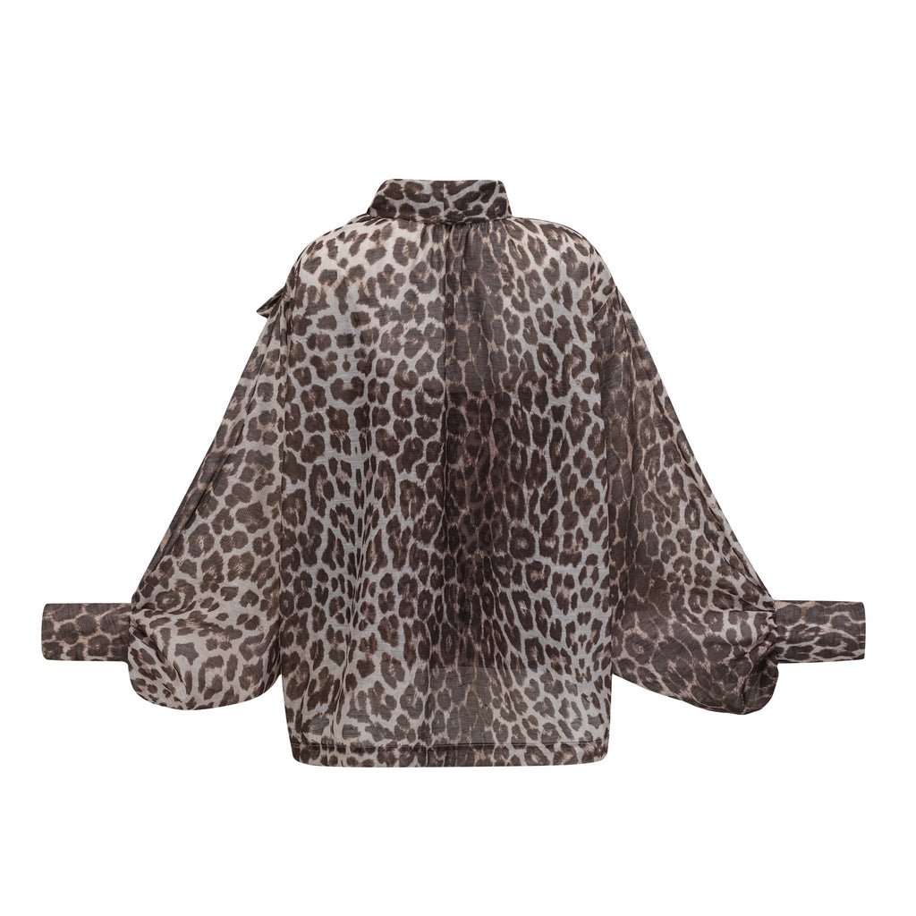 Blusa oversize de manga larga con estampado de leopardo de la marca Final Sale, con detalles de diseño llamativos y estilo moderno