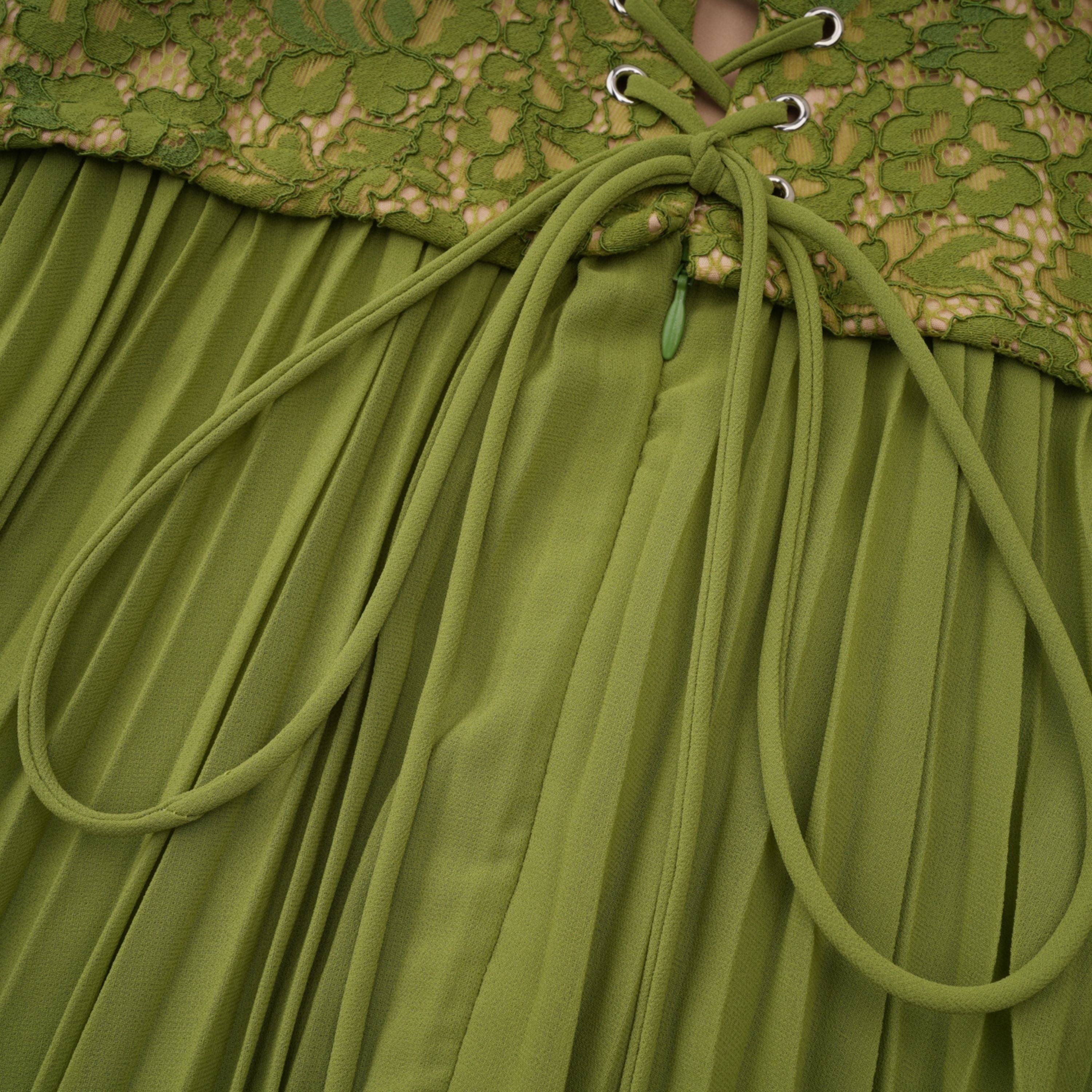 Vestido de noche corsé Ronja Emerald de MRNewyork con diseño ajustado y detalles elegantes en color esmeralda.