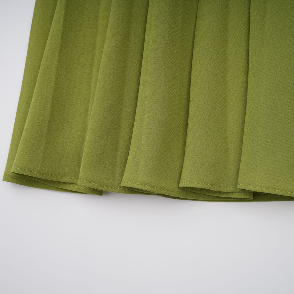 Vestido largo con corsé verde esmeralda Ronja de MRNewyork, con detalles elegantes y diseño ajustado en la parte superior.
