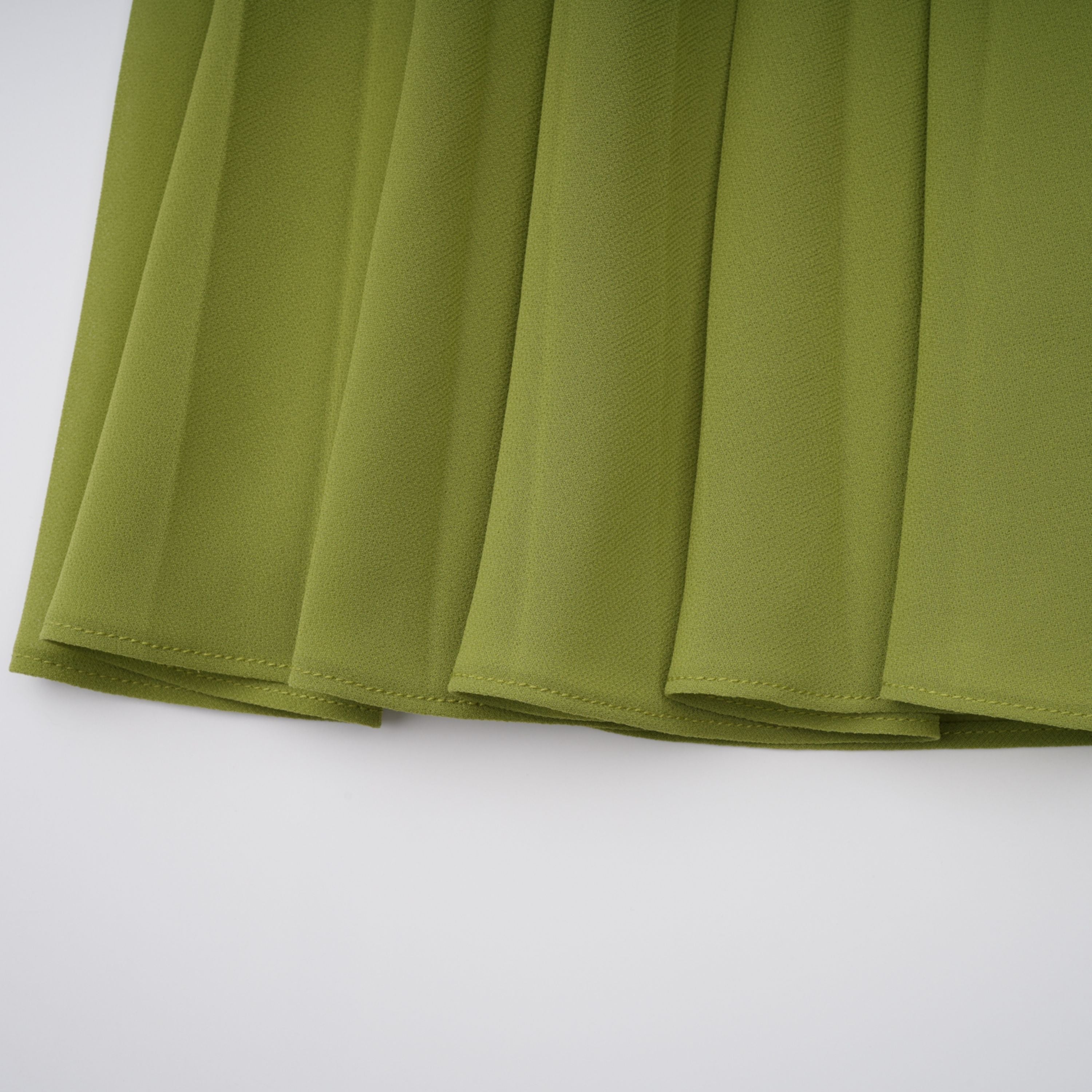 Vestido largo con corsé verde esmeralda Ronja de MRNewyork, con detalles elegantes y diseño ajustado en la parte superior.