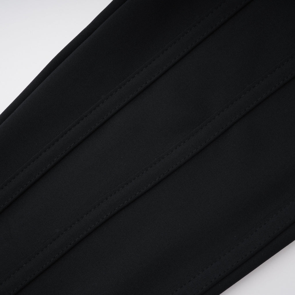 Leggings negras Bridal Cordelia con costuras decorativas, ajuste ajustado y diseño elegante para mujer.