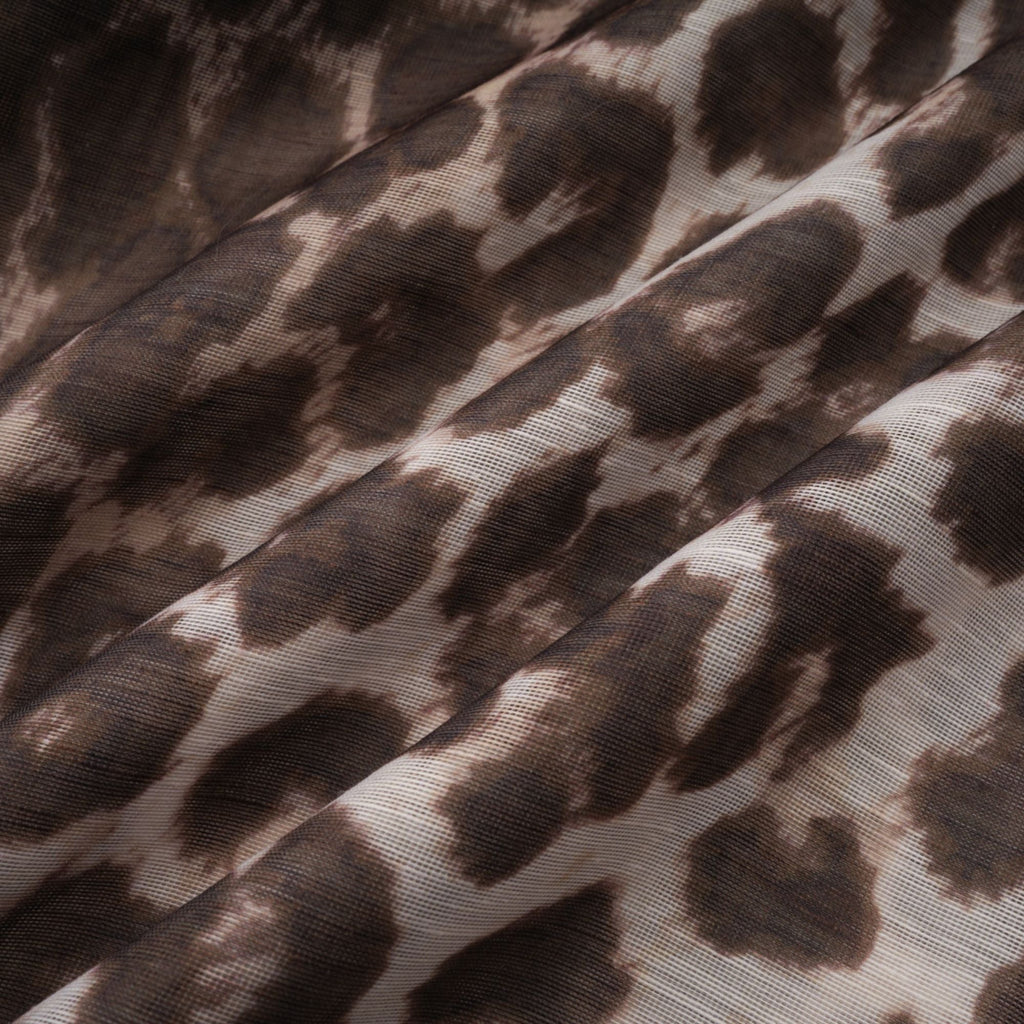 Blusa de manga oversize con estampado de leopardo de la marca Final Sale, mostrando el diseño de la prenda en la imagen.