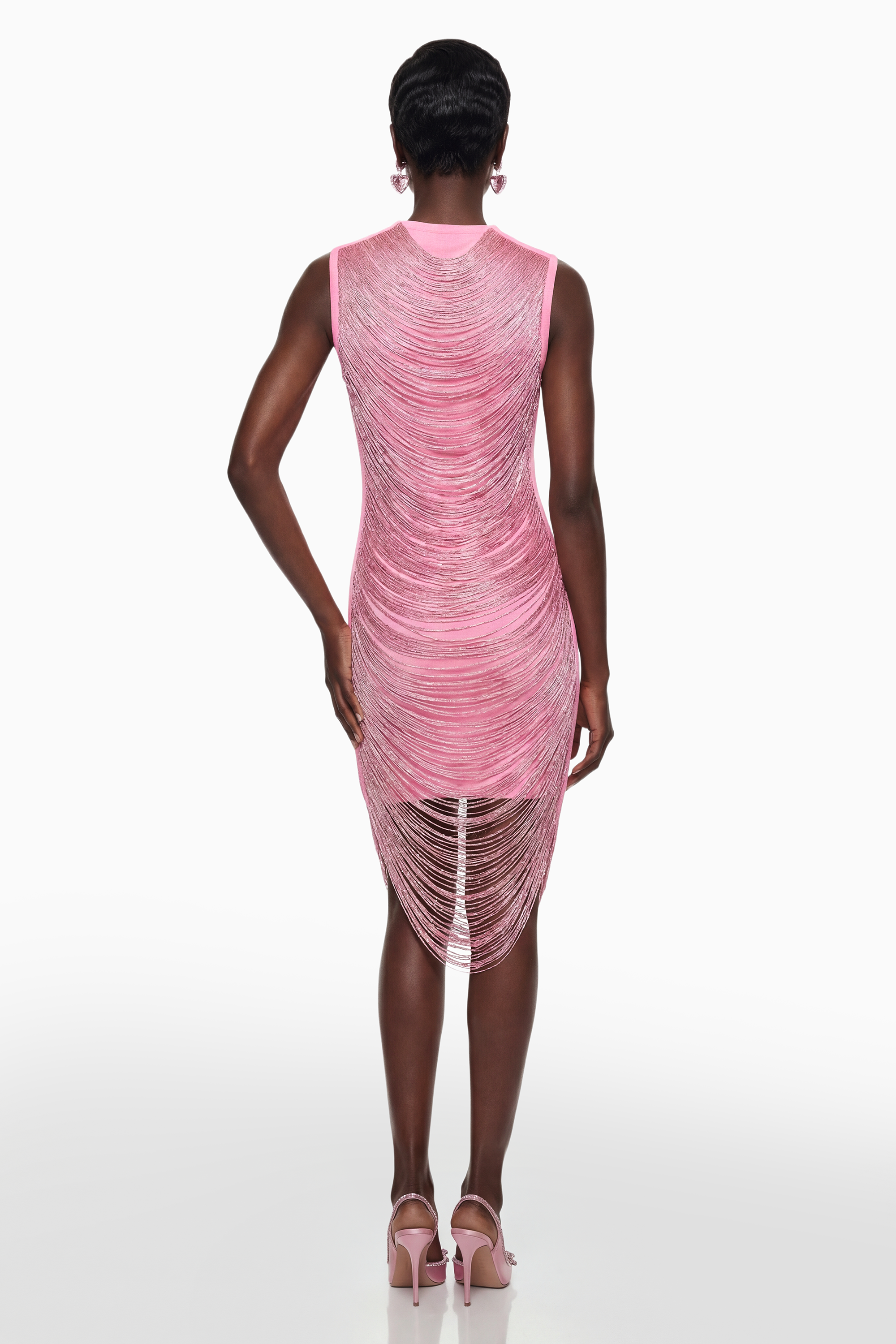 Vestido mini de bandage rosa Eleonora de MRTokyo con flecos, ajustado y elegante, con detalles llamativos en el diseño.