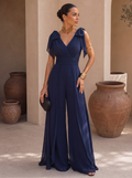 Abito tuta lunga con scollo all'americana e sciarpa in chiffon