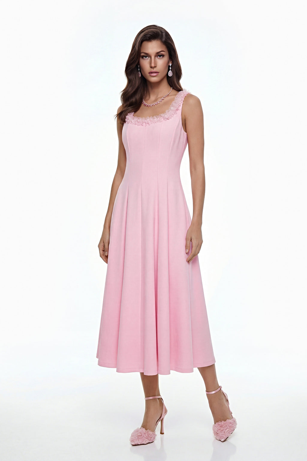 Vestido midi plisado rosa Zinnia con pétalos 3D de MRNewyork, mostrando su diseño elegante y detalles en la imagen