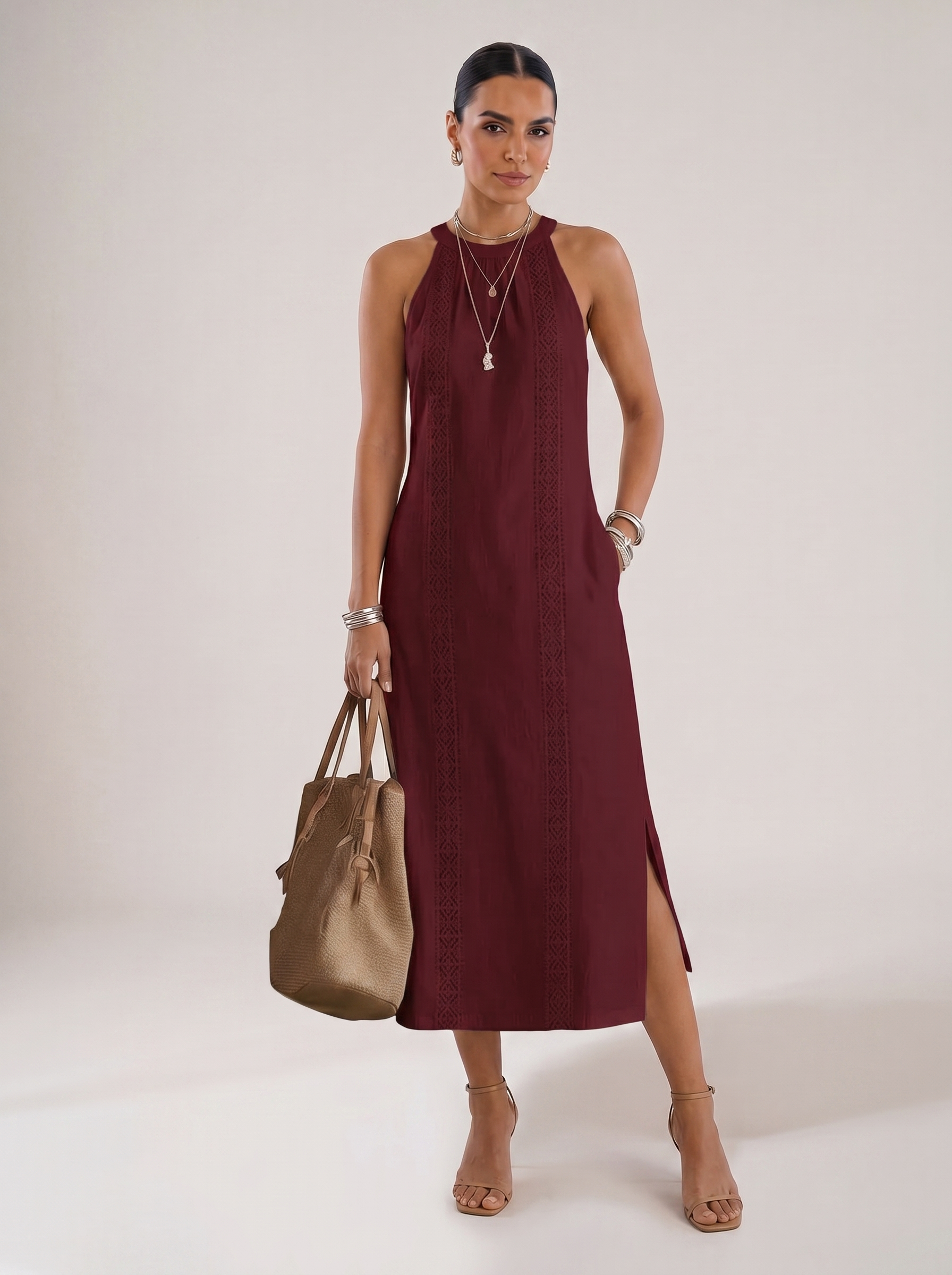 Vestido midi Jimena de Elara Voss, diseño elegante en tela fluida, con detalles de cintura y largo midi.
