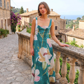 Vestido largo Antheia Meadow Bloom de DION NOIR, vestido de fiesta con estampado floral y diseño elegante.